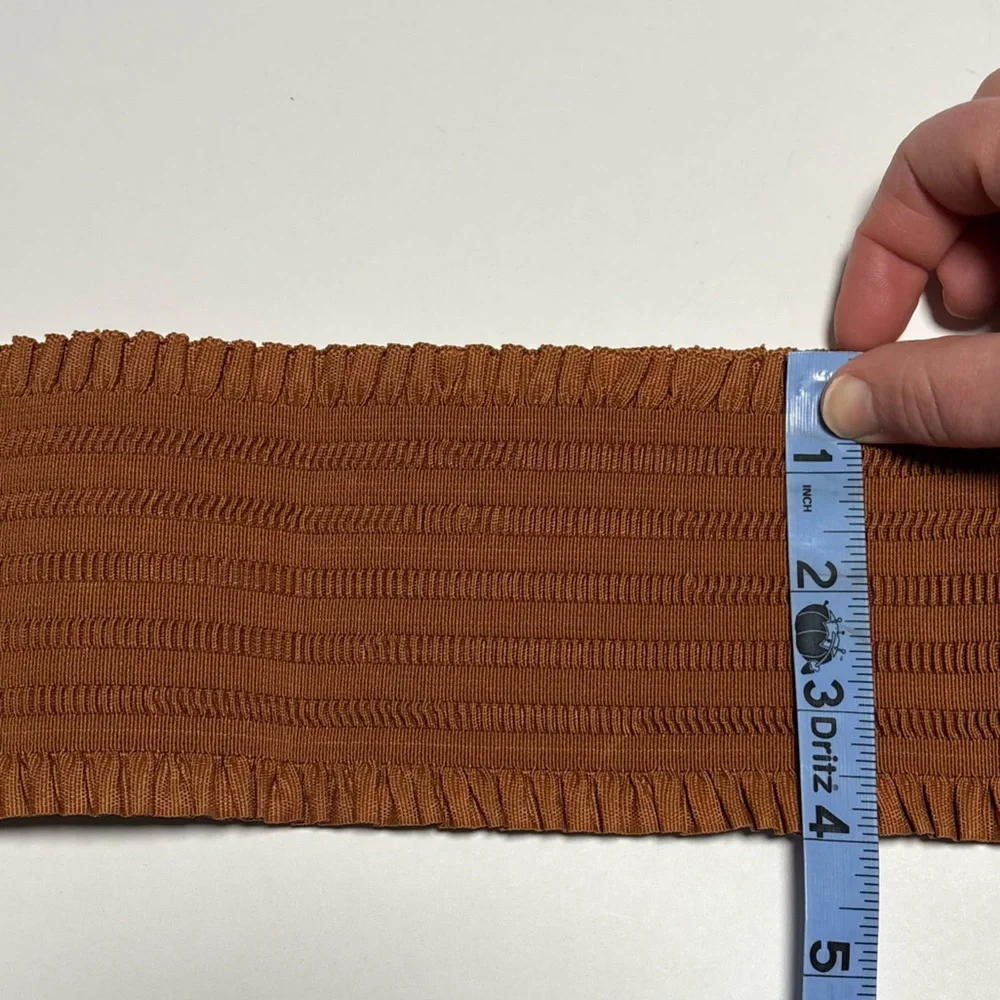 Wide, stretchy belt with ruffle edges and faux leather detail, OS